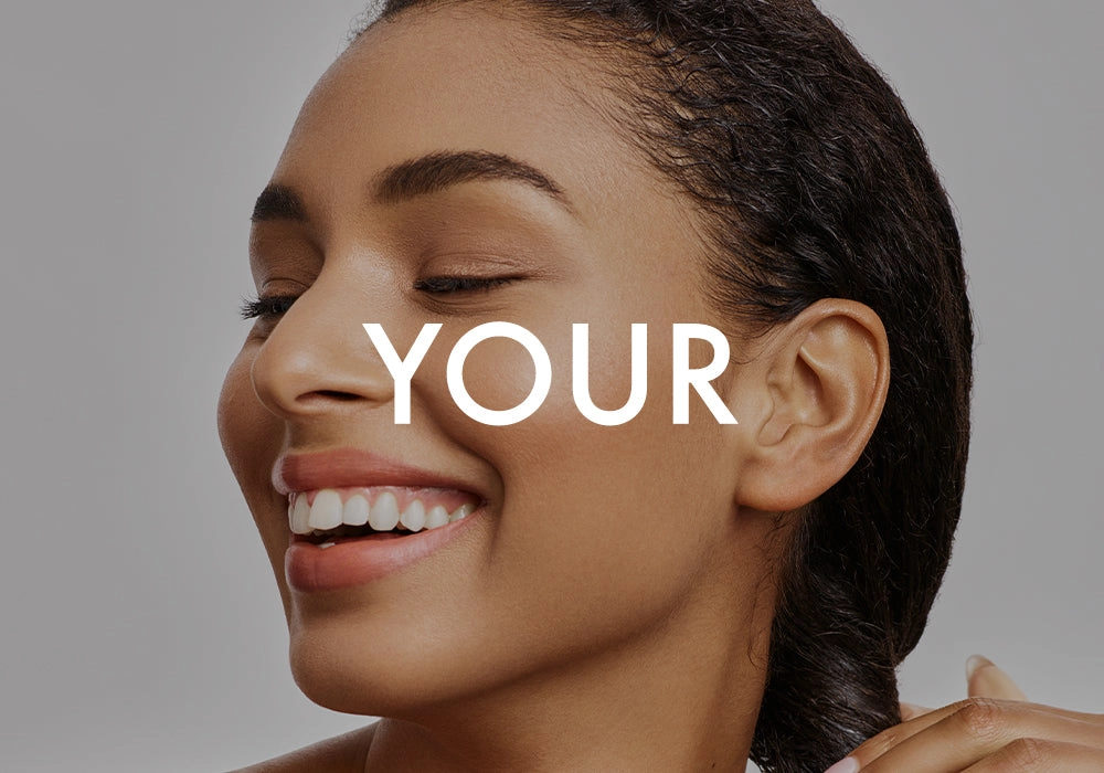 YOUR: smiling woman with wet hair slicked back